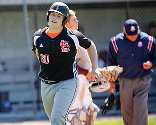 Springfield's Chris Thompson walks back to the dugout after hitting a home run in the second inning, making the score 1-8, during their game against South Range on Saturday at Springfield High School. Springfield won in the 10th inning 9-8. EMILY MATTHEWS | THE VINDICATOR