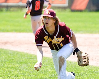 South Range's Brandon Mikos prepares to toss the ball to first during their game against Springfield on Saturday at Springfield High School. Springfield won in the 10th inning 9-8. EMILY MATTHEWS | THE VINDICATOR