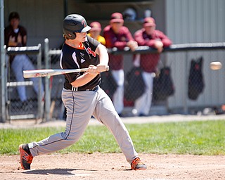 Springfield's Chris Thompson hits the ball during their game against South Range on Saturday at Springfield High School. Springfield won in the 10th inning 9-8. EMILY MATTHEWS | THE VINDICATOR