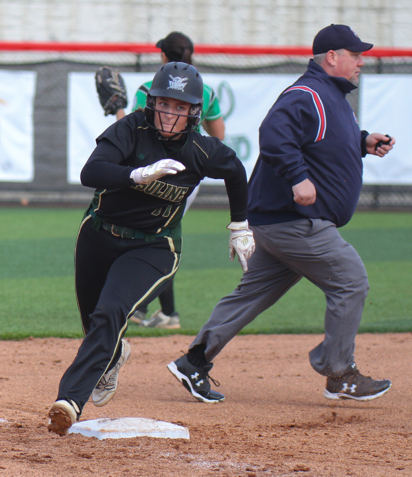 William D. Lewis The Vindicator  Ursuline's Julia Nutter(17) rounds 3rd to score duirng 1rst inning of 5-14-19 game with West branch at YSU.