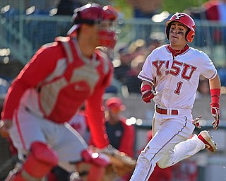 NILES, OHIO - MAY 14, 2019: Youngstown State's Lucas Nasonti scores a run on a RBI-single by Jeff Wehler in the first inning of Tuesday nights game against Ohio State at Eastwood Field. Ohio State won 7-4. DAVID DERMER | THE VINDICATOR