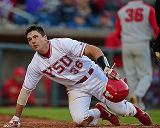 NILES, OHIO - MAY 14, 2019: Youngstown State's Dylan Swarmer reacts after being tagged out at home plate by Ohio State's Brent Todys in the seventh inning of Tuesday nights game against Ohio State at Eastwood Field. Ohio State won 7-4. DAVID DERMER | THE VINDICATOR