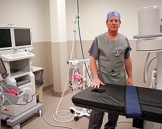 Tom Gemma, medical director and pain management doctor, stands in a procedure suite in the new Southwoods Pain and Spine Center on Monday morning. EMILY MATTHEWS | THE VINDICATOR