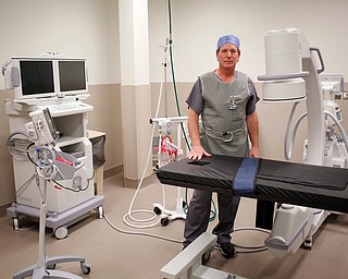Tom Gemma, medical director and pain management doctor, stands in a procedure suite in the new Southwoods Pain and Spine Center on Monday morning. EMILY MATTHEWS | THE VINDICATOR
