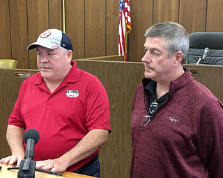 Rick Rolfe, left, and his brother, Mike Rolfe, stand in the Warren City Council chambers Wednesday answering questions about Friday’s shooting at their bar, the University At Larchmont on Larchmont Avenue in Warren.