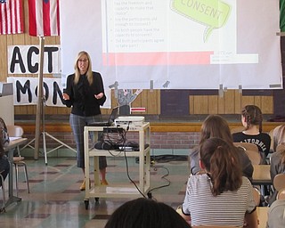 Neighbors | Jessica Harker .Jill Miller from Akron Children's hospital addressed the topic of consent with girls from Glenwood Junior High School at the Cyber Safety presentation event March 26.