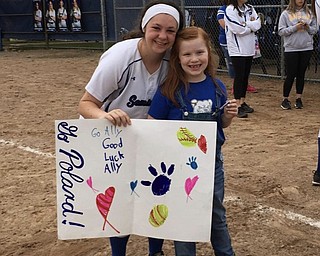 Neighbors | Submitted.Poland High School junior softball player Ally Nittoli was cheered on by her Little Dog Carmella at the Poland versus Niles game, which Poland won 11-1 in six innings.
