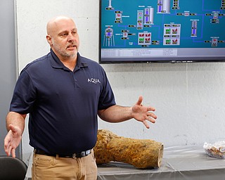 George Ginnis, project manager at Aqua Ohio, discusses progress on the renovations at the Aqua Ohio water plant in Poland on Thursday morning. EMILY MATTHEWS | THE VINDICATOR