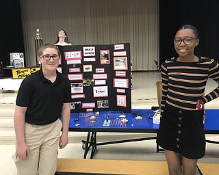 Neighbors | Jessica Harker.AMS students Mason Prosser and Dashia Johnson presented during the schools annual STEM showcase May 7.