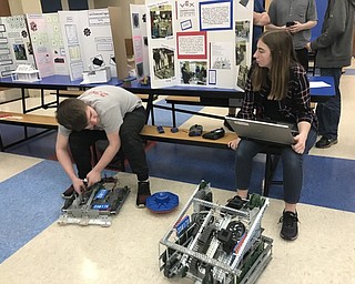 Neighbors | Jessica Harker.Austintown Fitch High School student members of the VEX robotics team showed off the team's robots at Austintown's seventh annual STEM showcase at Austintown Middle School on May 7.