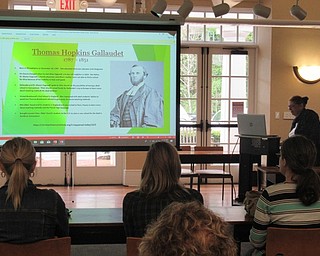 Neighbors | Jessica Harker.Guest speaker Irene Tunanidas spoke about the history of deaf culture around the world to community members, both hearing and deaf, at the Poland library May 10.