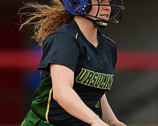 YOUNGSTOWN, OHIO - MAY 16, 2019: Ursuline's Alyssa Sheely runs to first after hitting a single in the sixth inning of Thursday afternoons OHSAA Tournament game at Youngstown State University. Poland won 7-6. DAVID DERMER | THE VINDICATOR