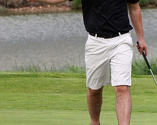 William D. Lewis The vindicator Joe Santisi reacts after sinking a putt at Firestone Farms during GGOV action 5-17-19.