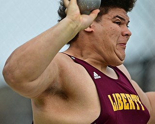 NEW SPRINGFIELD, OHIO - MAY 17, 2019: Liberty's Simele Moananu competes during the boys shot-put, Friday night during the Division III District Track Meet at Springfield High School. DAVID DERMER | THE VINDICATOR