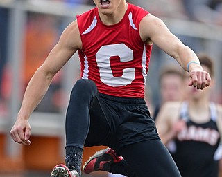 NEW SPRINGFIELD, OHIO - MAY 17, 2019: Columbiana's Joseph Bable clears a hurdle during the boys 300 hurdles, Friday night during the Division III District Track Meet at Springfield High School. DAVID DERMER | THE VINDICATOR