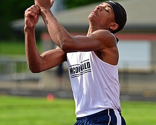 NEW SPRINGFIELD, OHIO - MAY 17, 2019: McDonald's Cam Tucker competes during the boys high jump, Friday night during the Division III District Track Meet at Springfield High School. DAVID DERMER | THE VINDICATOR