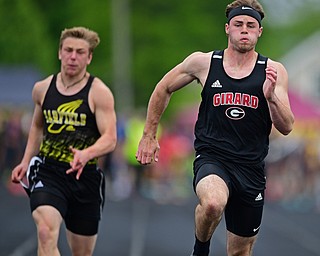 CORTLAND, OHIO - MAY 18, 2019: Girard's Nicolas Malito, right, runs to the finish line with Garfield's Devyn Penna during the boys 100 meter dash, Saturday morning during the Division II District Track Meet at Lakeview High School. DAVID DERMER | THE VINDICATOR