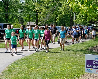 People walk in the 20th annual Mahoning/Trumbull Great Strides cystic fibrosis walk at Boardman Park on Sunday afternoon. EMILY MATTHEWS | THE VINDICATOR