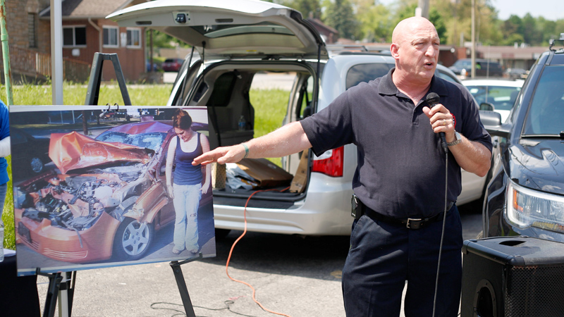 David Moore, a paramedic with Green Township Fire Department, tells how a seat belt possibly saved the life of his daughter Jenifer Moore when she was in a car accident in 2007. He and others shared stories of seat belts’ value during the launch of the 2019 Click it or Ticket campaign Sunday in Youngstown.