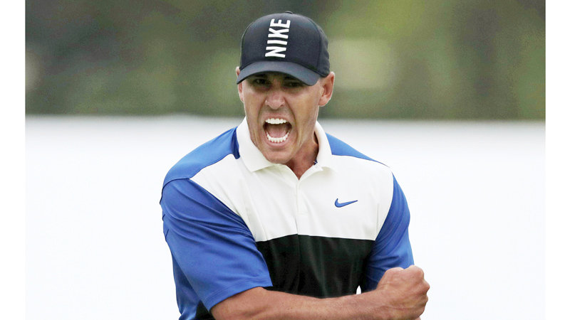 Brooks Koepka reacts after sinking a putt on the 18th green to win the PGA Championship on Sunday in Farmingdale, N.Y.
