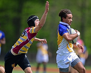 AVON LAKE, OHIO - MAY 19, 2019: Youngstown East's Timmy Bowser runs away from a Avon Lake defender and in for a score during the first half of their game, Sunday afternoon at Avon Lake High School. DAVID DERMER | THE VINDICATOR