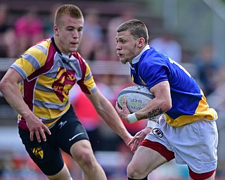 AVON LAKE, OHIO - MAY 19, 2019: Youngstown East's Samuel Cartagena runs the ball during the second half of their game, Sunday afternoon at Avon Lake High School. DAVID DERMER | THE VINDICATOR