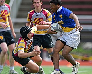 AVON LAKE, OHIO - MAY 19, 2019: Youngstown East's XXXX runs the ball during the second half of their game, Sunday afternoon at Avon Lake High School. DAVID DERMER | THE VINDICATOR