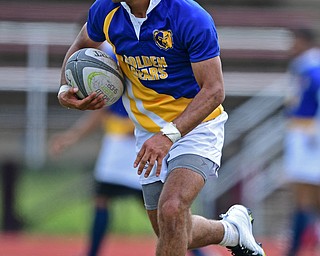 AVON LAKE, OHIO - MAY 19, 2019: Youngstown East's Timmy Bowser runs the ball during the second half of their game, Sunday afternoon at Avon Lake High School. DAVID DERMER | THE VINDICATOR