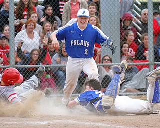 William D. Lewis The Vindictor Poland's catcher MJ Farber(25) tags Niles' Brandon Hayes(12) as Poland's Alex Barth(2) reacts during game ending play. Poland won 8-7.