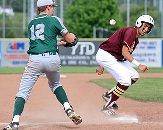 William D. Lewis The Vindicator  South Range's Kris Scandy(6) is safe at 3rd as Canton's Chris Wilson(12) misses the throw during 5-22-19 action at Cene.