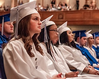 DIANNA OATRIDGE | THE VINDICATOR  Isabella Bornes, foreground, listens to the commencement address along with her classmates at the Class of 2019 Hubbard High School Commencement held at Stambaugh Auditorium on Wednesday night.