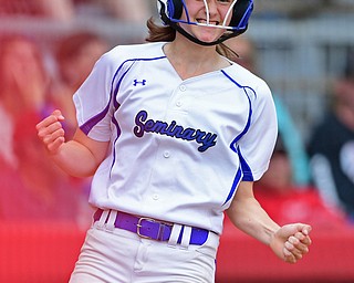 AKRON, OHIO - MAY 22, 2019: Poland's Emily Denny celebrates after scoring a run in the third inning of their OHSAA Tournament game, Wednesday night at Firestone Stadium. Poland won 6-5. DAVID DERMER | THE VINDICATOR