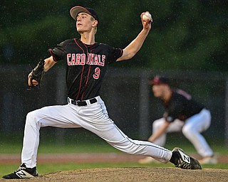 STRUTHERS, OHIO - MAY 22, 2019: Canfield starting pitcher Michael Buddle delivers in the second inning of their OHSAA Tournament game, Wednesday night at Cene Park. DAVID DERMER | THE VINDICATOR
