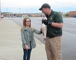 Neighbors | Jessica Harker.Austintown Internediate School student volunteers assisted members of the Ohio Division of Wildlife during their presentation on Ohio fish species on April 23.