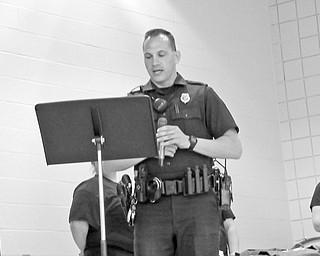 Neighbors | Jessica Harker .DARE Officer David Potkonicki addressed fifth-graders at their farewell ceremony on May 14 quoting Dr. Seuss by saying, "Be yourself because those that mind don't matter and those that matter don't mind."