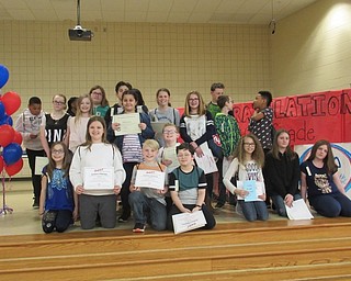 Neighbors | Jessica Harker .Fifth-graders at Austintown Intermediate School posed as a group after receiving their graduation certificates from their teacher and DARE officer.