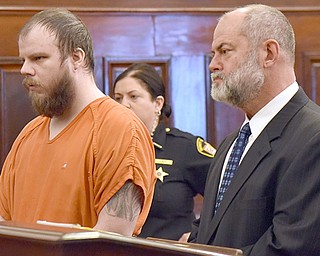 Marc Flora, 30, seen here with attorney Doug Taylor, was sentenced to 30 years to life in prison by Judge R. Scott Krichbaum after pleading guilty to a charge of aggravated murder.