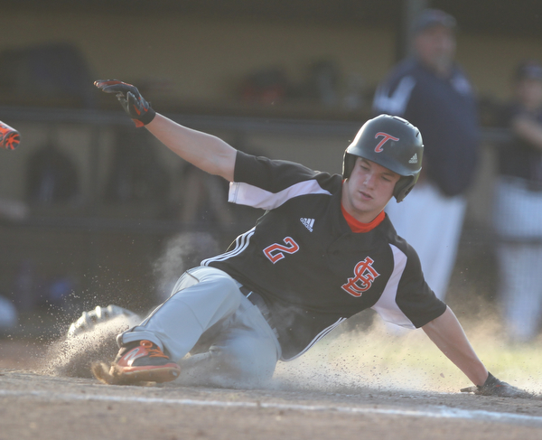 Nick Slike slides in safely at home during the district championship matchup against Warren JFK at Cene Park in Struthers on Thursday night.   Dustin Livesay  |  The Vindicator  5/23/19  Cene Park.