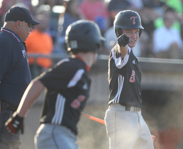 John Slike (5) points in celebration to his brother Nick Slike (2) after he crossed home plate during the district championship matchup against Warren JFK at Cene Park in Struthers on Thursday night.   Dustin Livesay  |  The Vindicator  5/23/19  Cene Park.