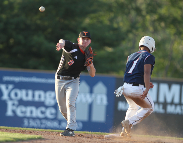 John Slike (5) of Springfield looks to turn a double play after getting Jordan Edmondson (1) of Warren JFK out at second during the dictrict championship matchup at Cene Park in Struthers on Thursday night.   Dustin Livesay  |  The Vindicator  5/23/19  Cene Park.