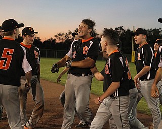 Shane Eynon of Springfield celebrates in the infield after hitting a game winning walk off single to defeat Warren JFK in the Distrct Championship at Cene Park in Struthers on Thursday night.   Dustin Livesay  |  The Vindicator  5/23/19  Cene Park.
