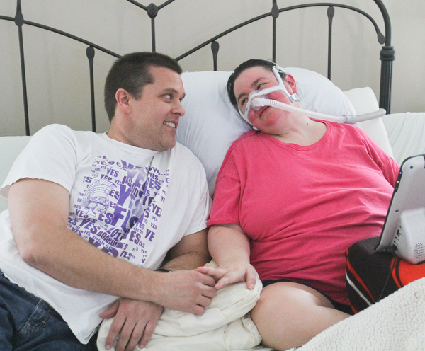William D. Lewis The Vindicator  Christine Terlesky , who has ALS, whares a moment with her husband Brian in their Boardman home 4-4-19.