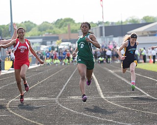From left, Ridgewood's Alexis Prater, LaBrae's Dynesty Ervin, Malvern's Zoe Moser, Hillsdale's Jordan Taylor, and Cornerstone Christian's Abby Suszek compete in the girls 100 dash during the Division III regional track meet at Massillon Perry High School on Friday. EMILY MATTHEWS | THE VINDICATOR