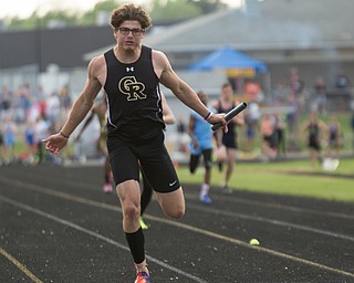 Crestview's Meredith finishes in first in the boys 800 relay during the Division III regional track meet at Massillon Perry High School on Friday. EMILY MATTHEWS | THE VINDICATOR