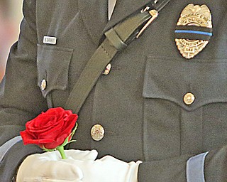 Friday was the annual Fallen Officers Memorial at Our Lady of Mount Carmel Church. Several departments from  Mahoning County attended. Each officer was remembered by having their name read and a rose placed on a memorial wreath.