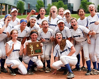 The Poland softball team celebrates after beating Crestwood to win the Division II regional finals at Firestone Stadium in Akron on Saturday. EMILY MATTHEWS | THE VINDICATOR