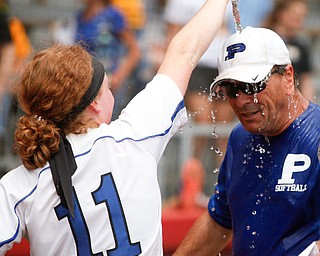 Poland's Lauren Sienkiewicz pours water on Head Coach Jim Serich after beating Crestwood to win the Division II regional finals at Firestone Stadium in Akron on Saturday. EMILY MATTHEWS | THE VINDICATOR