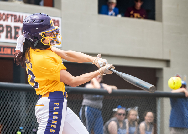 DIANNA OATRIDGE | THE VINDICATOR  Champion's Abbi Grace makes contact during their 3-0 victory against Northwestern in the Division III Regional Final on Saturday in Massilon.