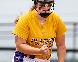 DIANNA OATRIDGE | THE VINDICATOR  Champion's Abby White fist pumps in celebration after the side is retired during the Division III Regional Final against Northwestern on Saturday in Massillon. Champion won 3-0.