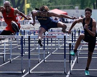 AUSTINTOWN, OHIO - May 24, 2019: Track & Field  D2 Region at Austintown-Fitch High School. .Boys 110m. Youngstown East's Tobias Hayes clears the last hurdle and finishes 2nd in a time of 14.59 secs. to qualify for the state meet, Photo by MICHAEL G. TAYLOR | THE VINDICATOR